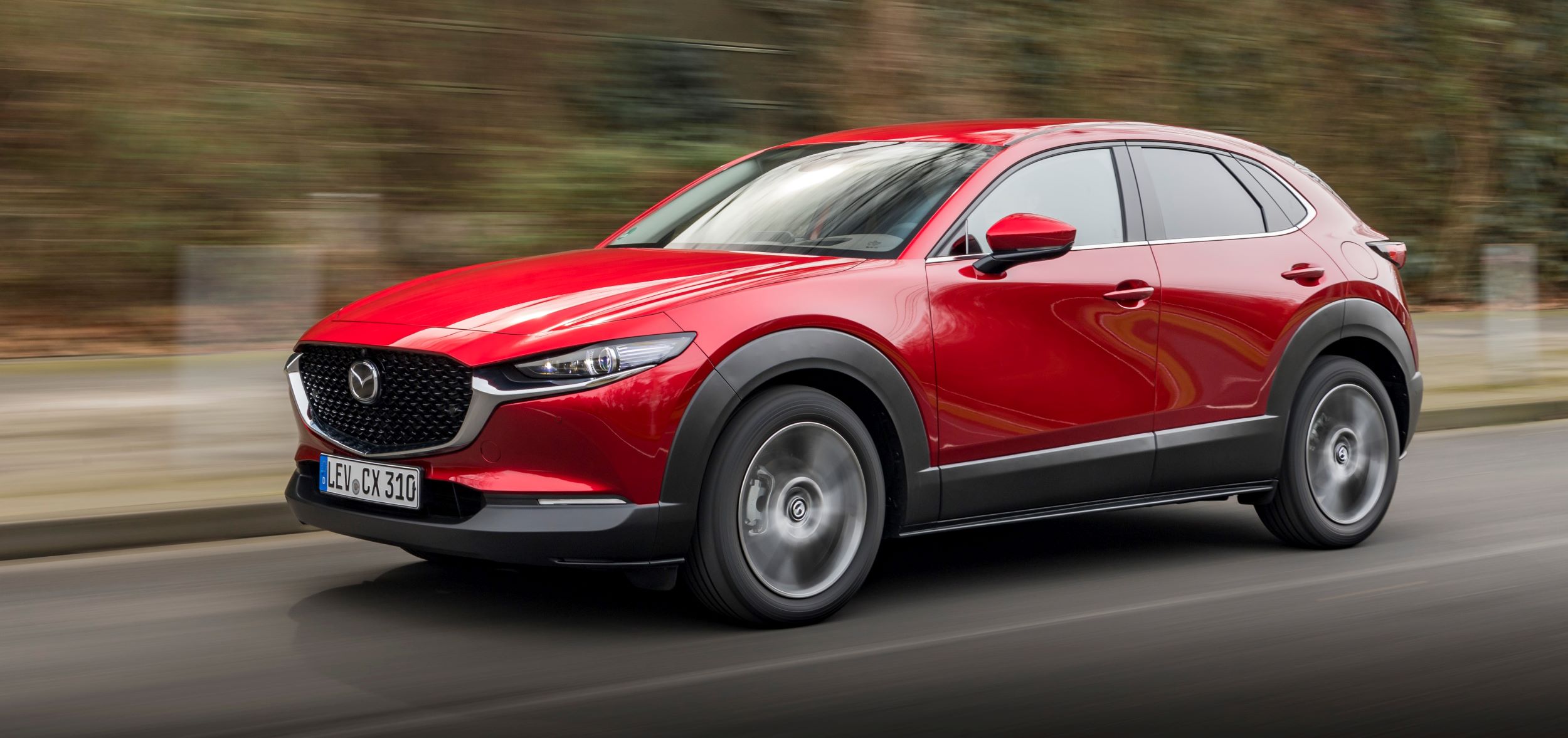 2021-Mazda-CX-30-Soul-Red-Crystal,-Action-05