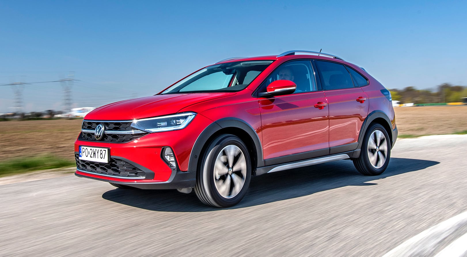 Volkswagen Taigo 1.0 TSI DSG Style – bok w ruchu