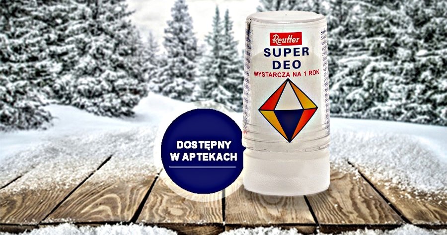 kobieta w górach z nartami i opkaownie Super Deo